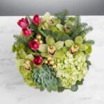 Elegant flower arrangement in a rustic wooden box.