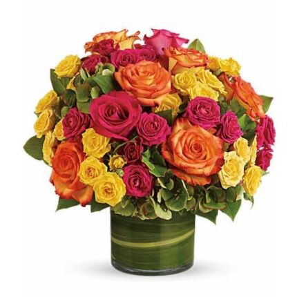 Blossoms in Vogue bouquet with pink orange roses and green hydrangea in glass vase Nashville TN